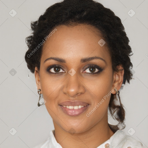 Joyful black young-adult female with short  brown hair and brown eyes