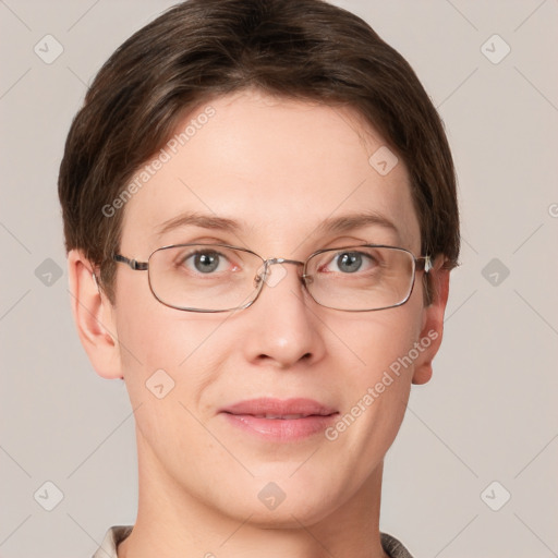 Joyful white adult female with short  brown hair and grey eyes