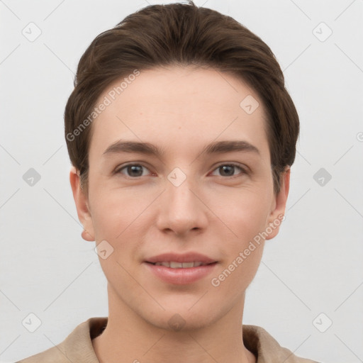 Joyful white young-adult female with short  brown hair and grey eyes