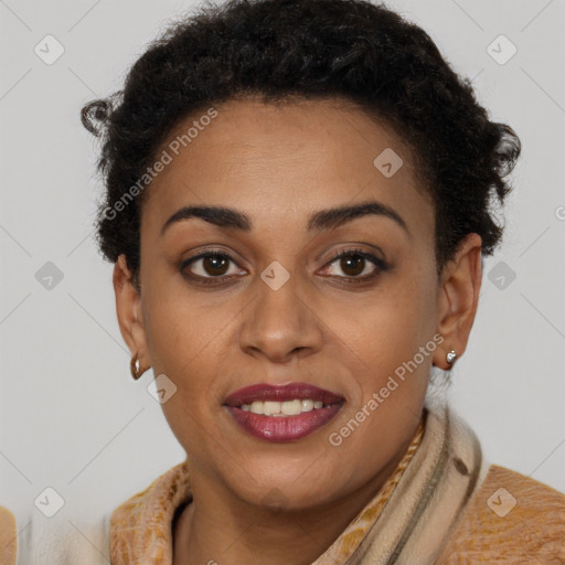 Joyful black young-adult female with short  brown hair and brown eyes