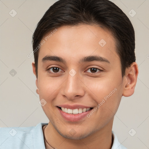 Joyful white young-adult male with short  brown hair and brown eyes