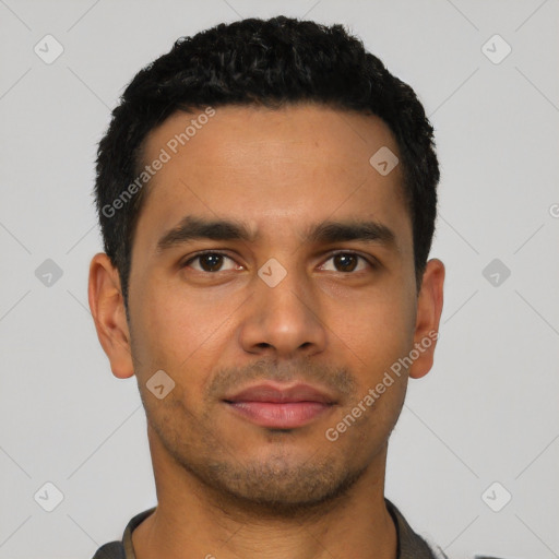 Neutral latino young-adult male with short  black hair and brown eyes