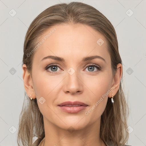 Joyful white young-adult female with long  brown hair and grey eyes