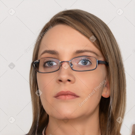 Neutral white young-adult female with long  brown hair and brown eyes