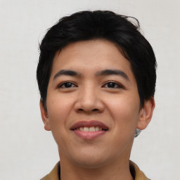 Joyful asian young-adult male with short  black hair and brown eyes