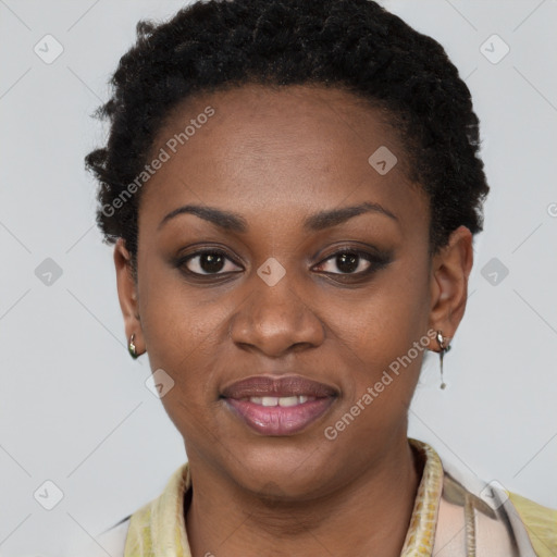 Joyful black young-adult female with short  brown hair and brown eyes