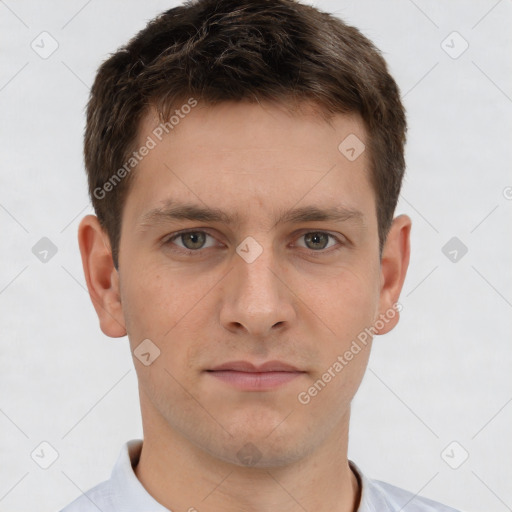 Neutral white young-adult male with short  brown hair and brown eyes