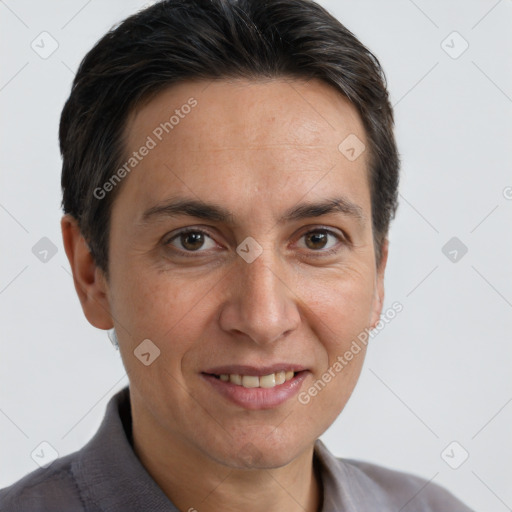 Joyful white adult male with short  brown hair and brown eyes