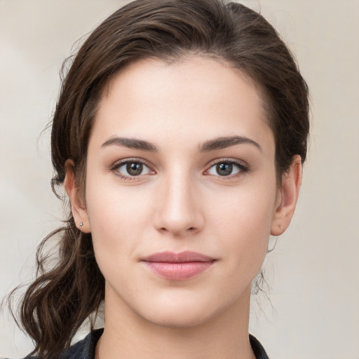 Neutral white young-adult female with medium  brown hair and brown eyes