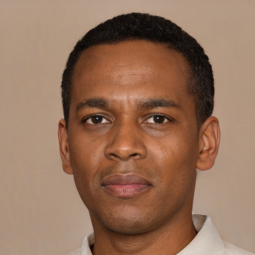 Neutral black young-adult male with short  black hair and brown eyes