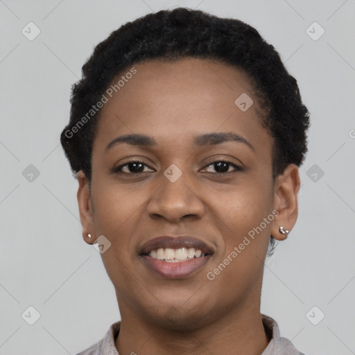 Joyful black young-adult female with short  black hair and brown eyes