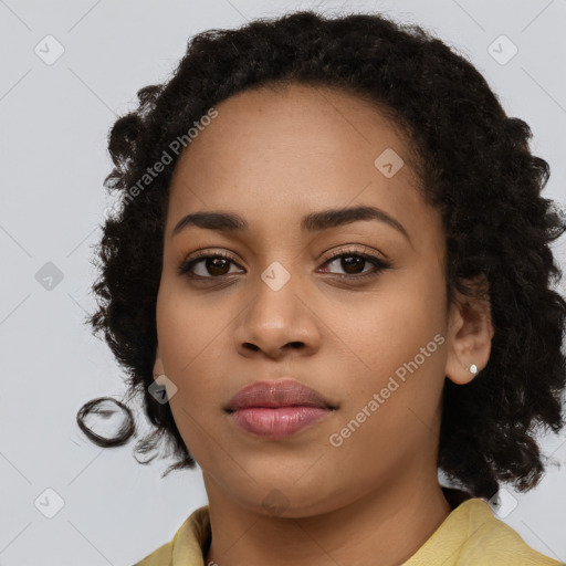 Joyful black young-adult female with medium  black hair and brown eyes