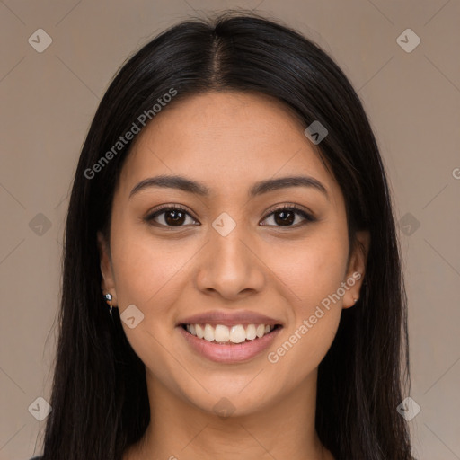 Joyful latino young-adult female with long  brown hair and brown eyes