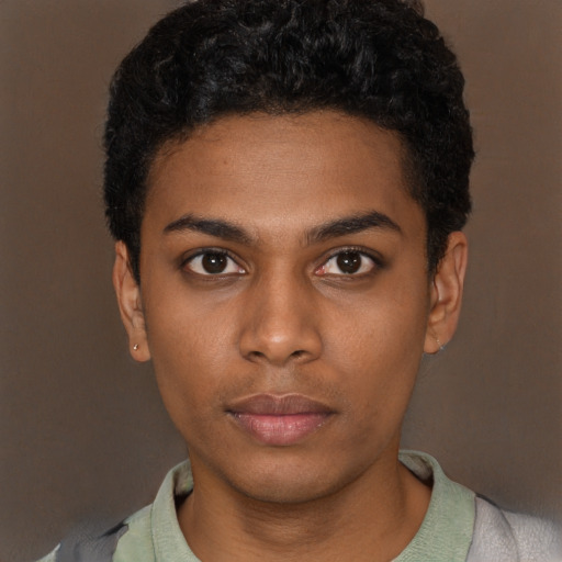 Neutral black young-adult male with short  black hair and brown eyes