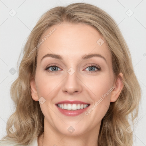 Joyful white young-adult female with medium  brown hair and blue eyes