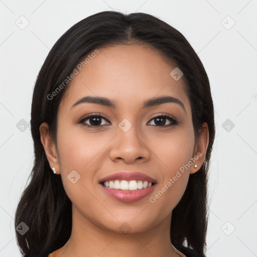 Joyful latino young-adult female with long  brown hair and brown eyes