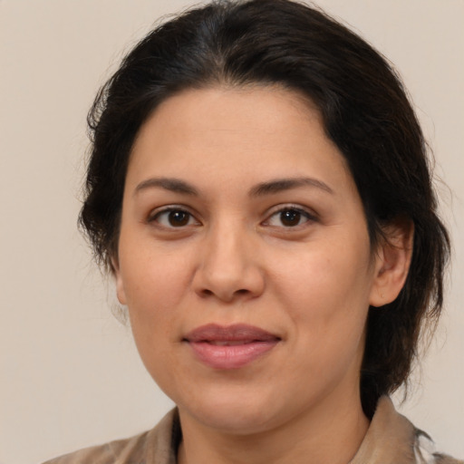 Joyful white young-adult female with medium  brown hair and brown eyes