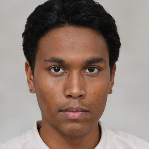 Neutral black young-adult male with short  black hair and brown eyes