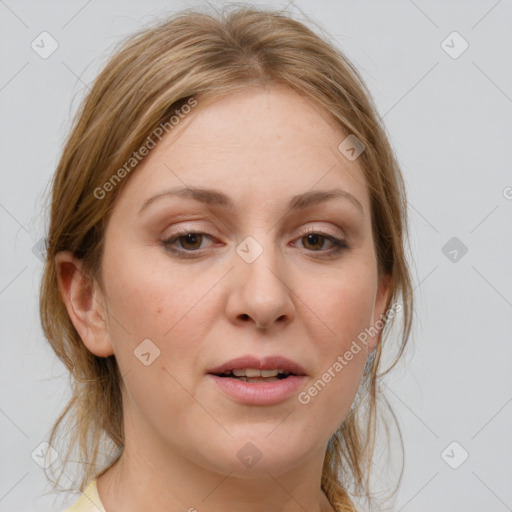 Joyful white young-adult female with medium  brown hair and blue eyes