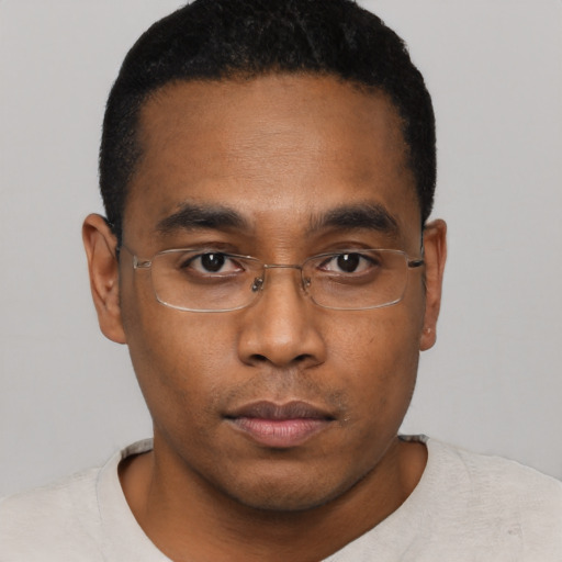 Neutral black young-adult male with short  black hair and brown eyes