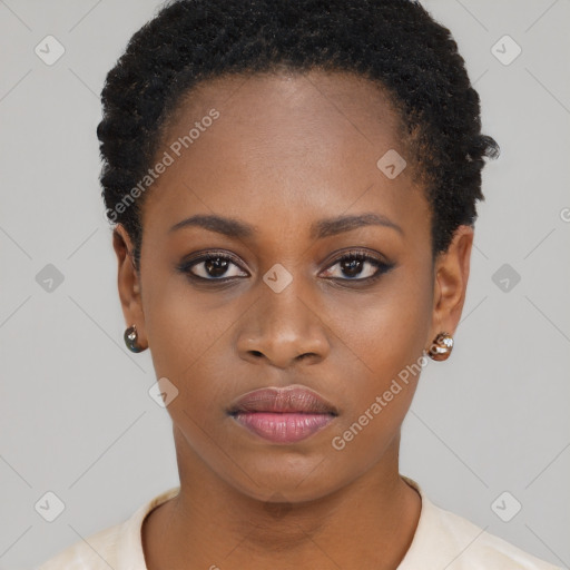 Neutral black young-adult female with short  brown hair and brown eyes