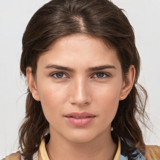 Neutral white young-adult female with medium  brown hair and brown eyes