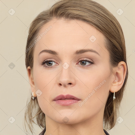 Neutral white young-adult female with medium  brown hair and brown eyes