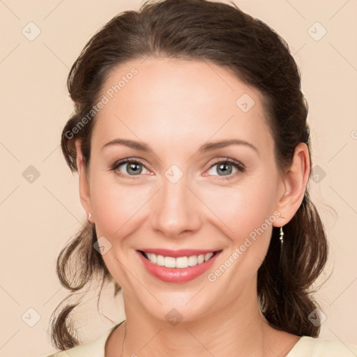 Joyful white young-adult female with medium  brown hair and green eyes