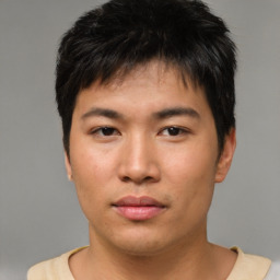 Neutral asian young-adult male with short  brown hair and brown eyes