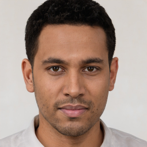 Neutral white young-adult male with short  black hair and brown eyes