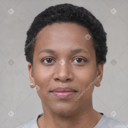 Joyful black young-adult female with short  black hair and brown eyes