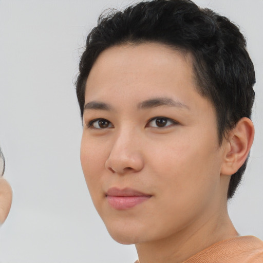 Neutral white young-adult female with short  black hair and brown eyes