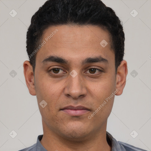 Neutral white young-adult male with short  black hair and brown eyes