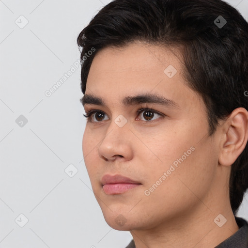 Neutral white young-adult male with short  black hair and brown eyes