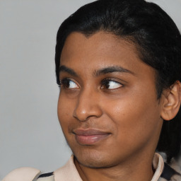 Joyful asian young-adult female with short  black hair and brown eyes