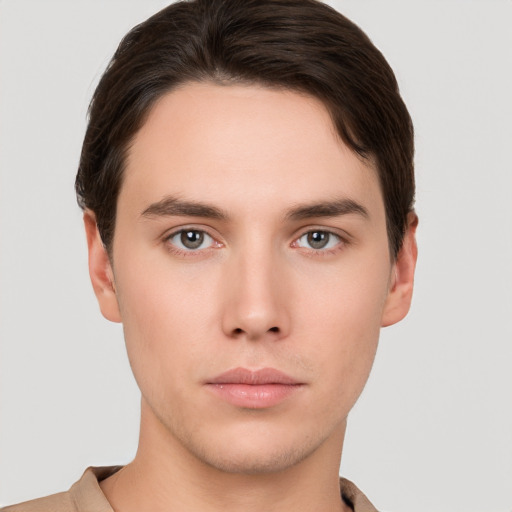 Neutral white young-adult male with short  brown hair and brown eyes