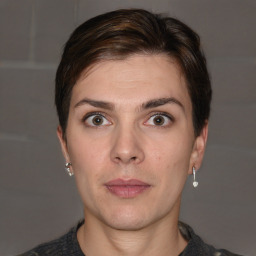 Neutral white young-adult female with short  brown hair and brown eyes