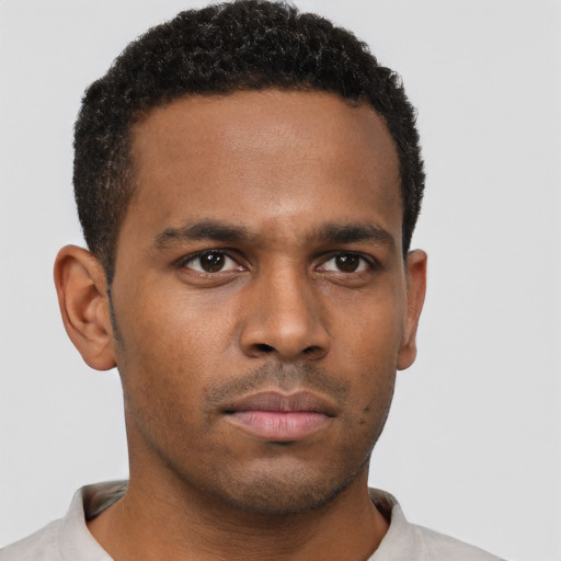 Neutral black young-adult male with short  brown hair and brown eyes