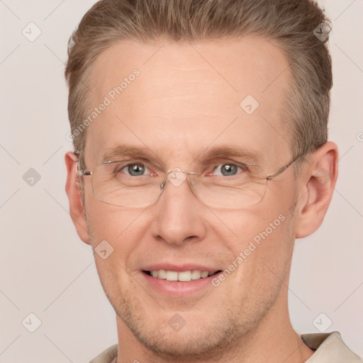 Joyful white adult male with short  brown hair and grey eyes