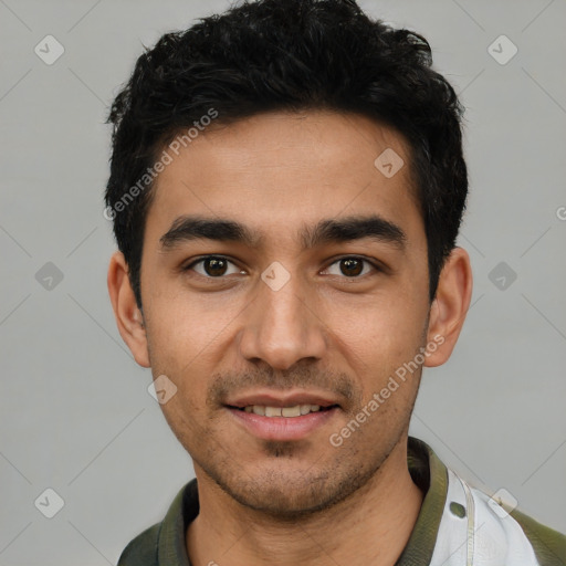 Joyful white young-adult male with short  black hair and brown eyes