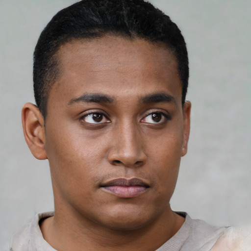 Neutral black young-adult male with short  black hair and brown eyes