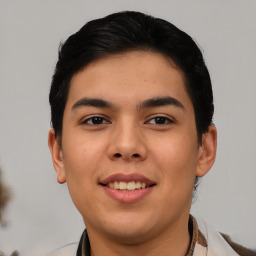 Joyful asian young-adult male with short  black hair and brown eyes