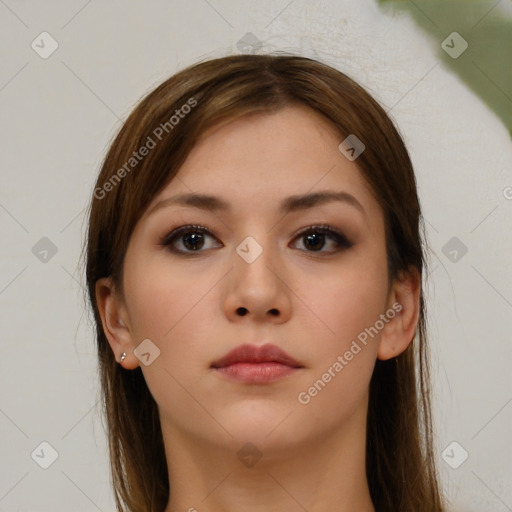 Neutral white young-adult female with long  brown hair and brown eyes