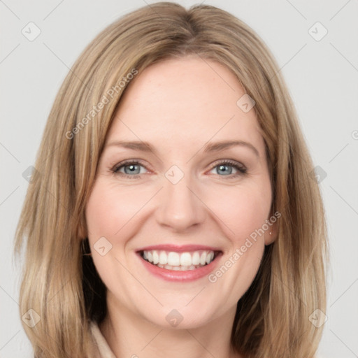 Joyful white young-adult female with medium  brown hair and green eyes