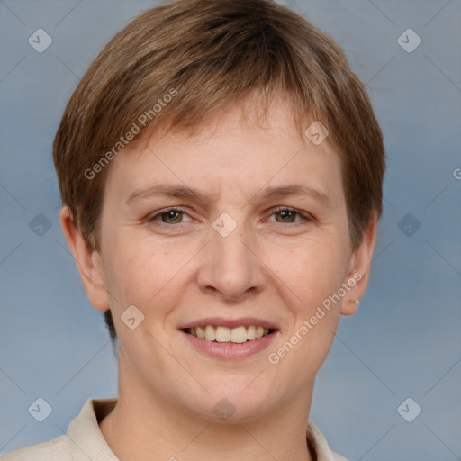 Joyful white adult female with short  brown hair and grey eyes