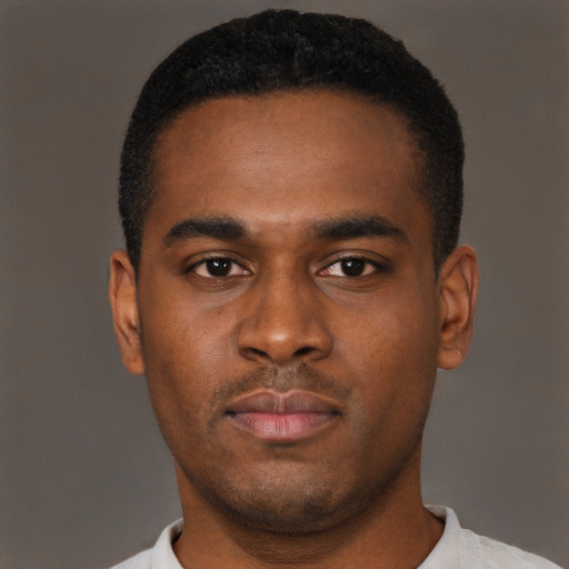 Neutral latino young-adult male with short  brown hair and brown eyes