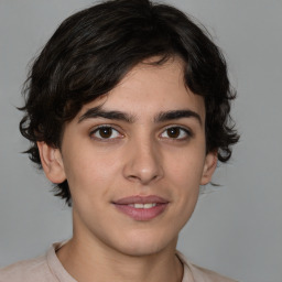 Joyful white young-adult male with medium  brown hair and brown eyes