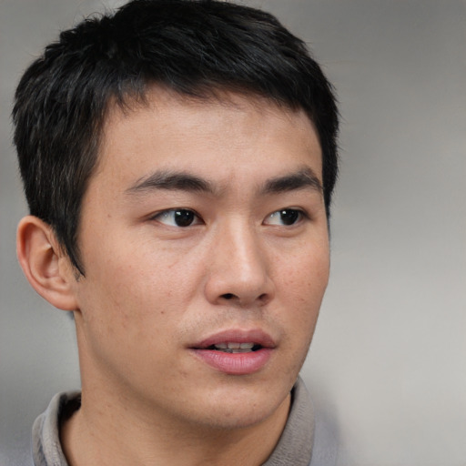Neutral asian young-adult male with short  brown hair and brown eyes