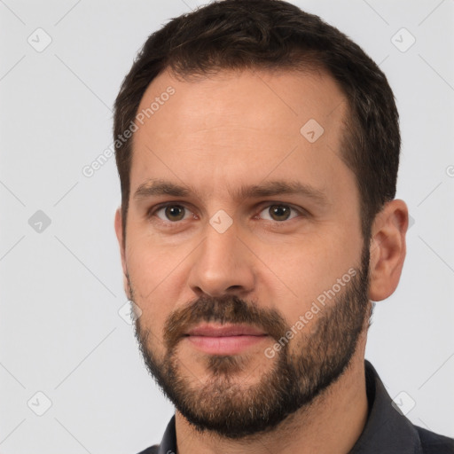 Neutral white young-adult male with short  brown hair and brown eyes