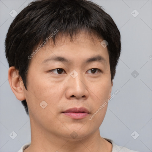 Neutral asian young-adult male with short  brown hair and brown eyes